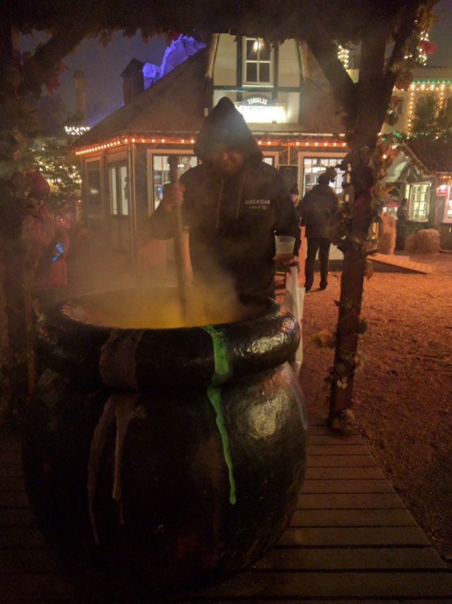Hubby stirring cauldron
